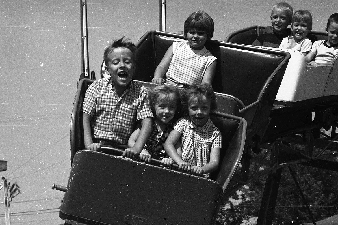 From 1967: “Of all the thrills at the Northwest Montana Fair and Rodeo this week, few if any exceed the thrill of a roller coaster at the carnival midway, especially if you are young like these four youngsters snapped as they made the circuit. The one in the back seat looks as though she had ridden before and it is now old hat.” (The photo appeare on the front page on Aug. 17, 1967.)