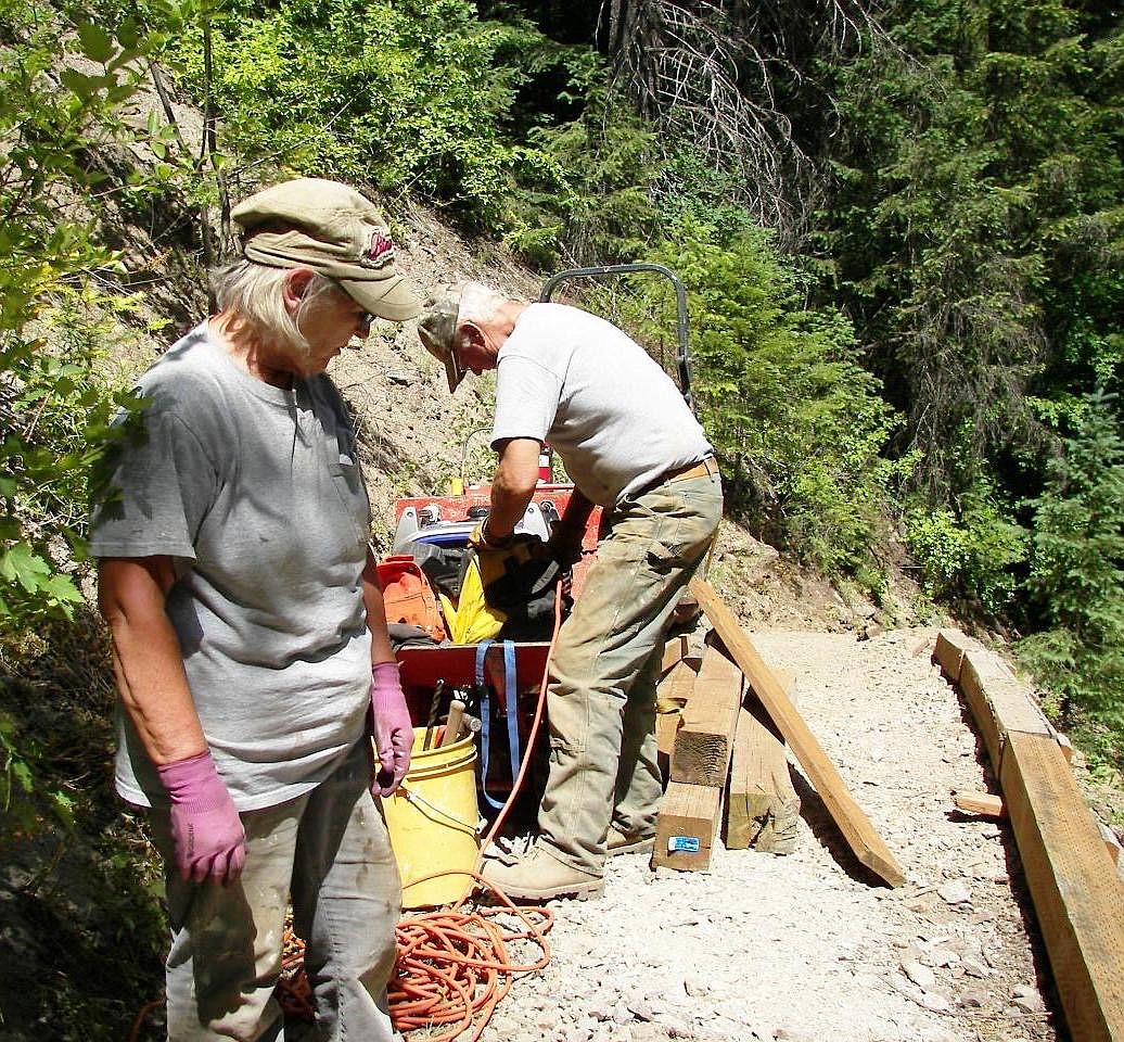 Kay &amp; Dwight Clift repairing trail.