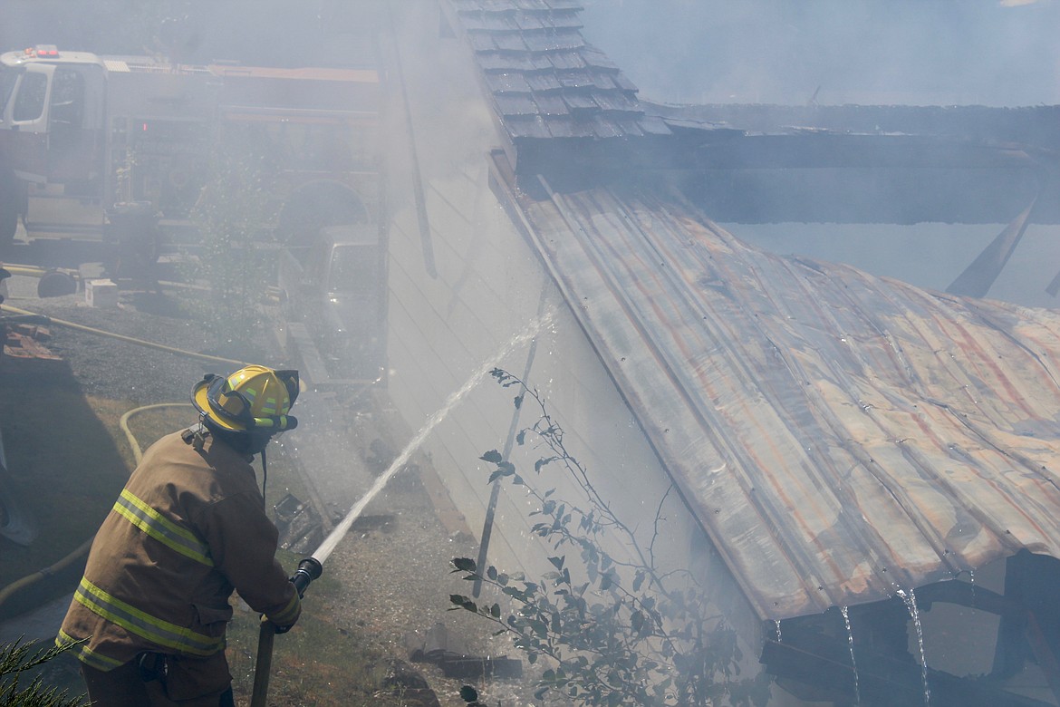 Crews worked quickly to ensure that flames did not jump to the neighboring home.