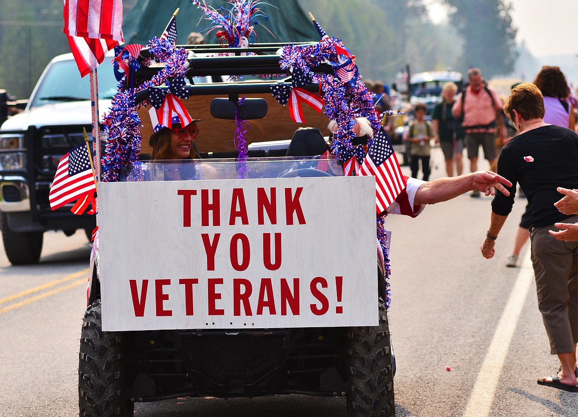 Pride for veterans were seen all through the parade. This dressed up vehicle was a hit as they handed out some candy to all those that waved and smiled. Photo Credit Erin Jusseaume Clark Fork Valley Press