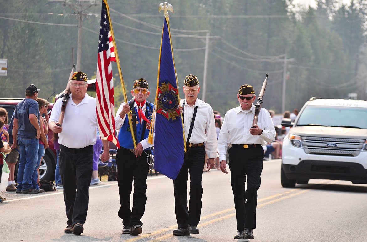 VFW members that kicked off the parade and the crows clapped and cheered as they passed by. Photo Credit Erin Jusseaume Clark Fork Valley Press