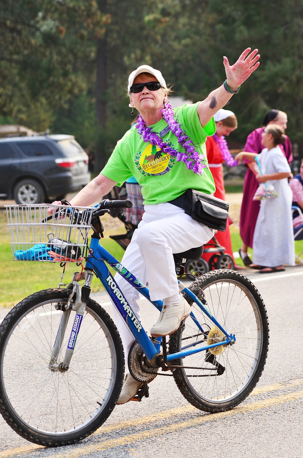 As the parade finished, every person in the crowd got a wave of thanks before they headed into the festival for the days events. Photo Credit Erin Jusseaume Clark Fork Valley Press