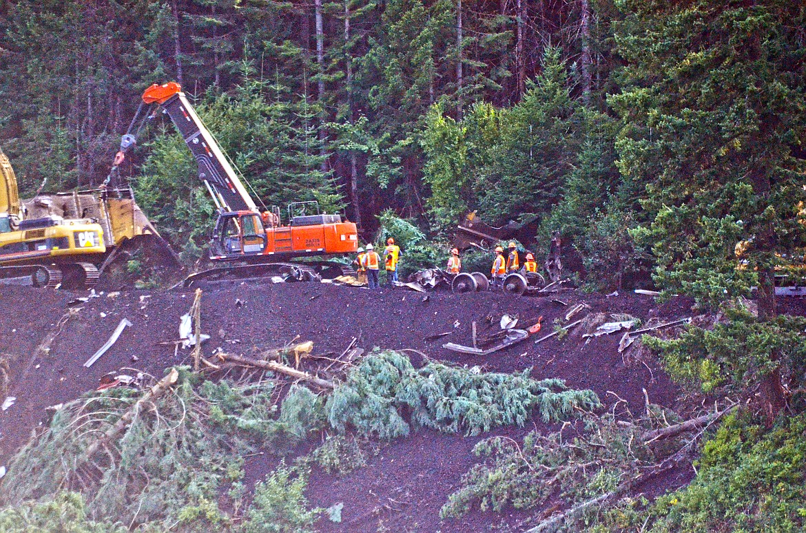 Crews and machinery working to clear the wreckage of the Montana Rail Link derailed coal train near Heron. Photo Credit Erin Jusseaume Clark Fork Valley Press