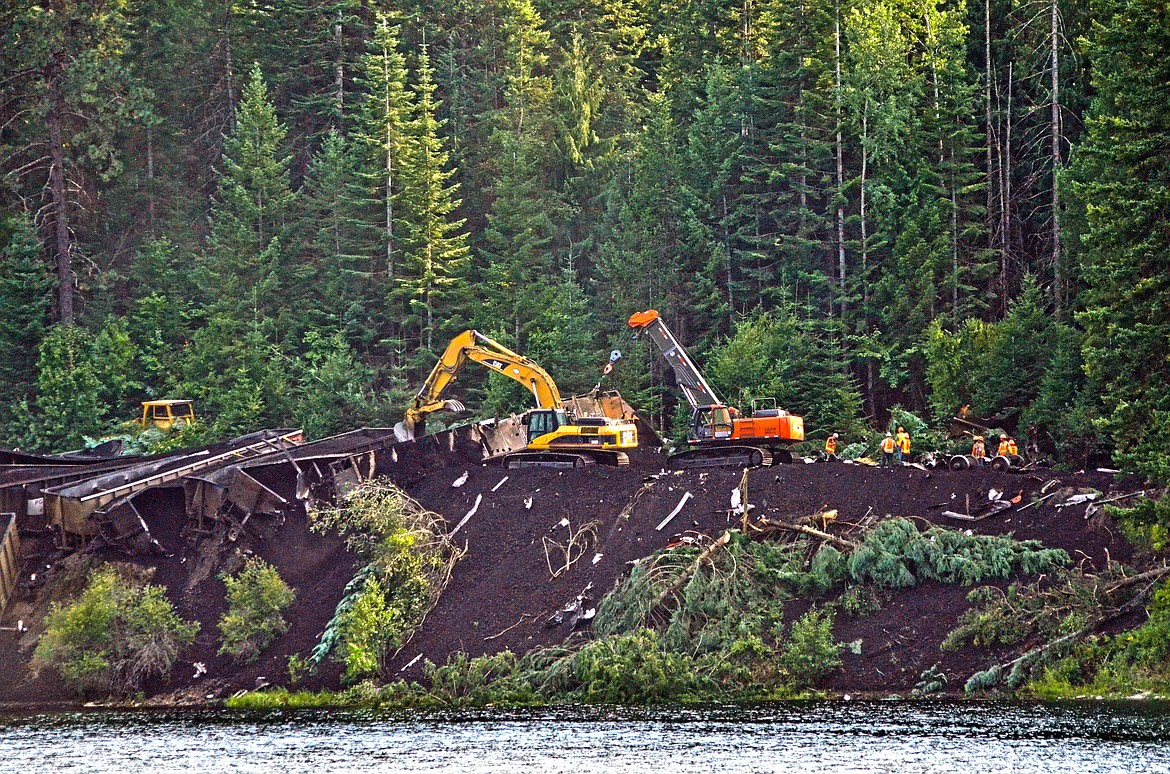 Crews and machinery working to clear the wreckage of the Montana Rail Link derailed coal train near Heron. Photo Credit Erin Jusseaume Clark Fork Valley Press