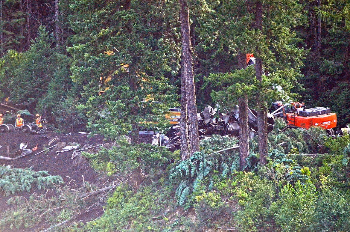 Machinery working to clear the wreckage of the Montana Rail Link derailed coal train near Heron. Photo Credit Erin Jusseaume Clark Fork Valley Press