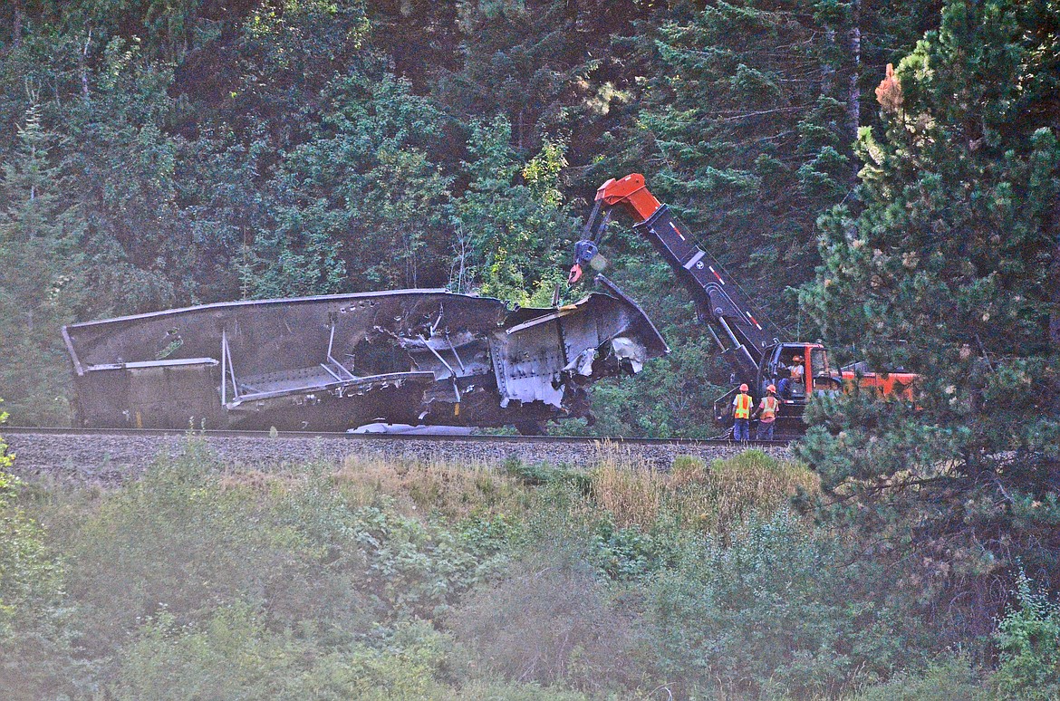 Crews and machinery working to clear the wreckage of the Montana Rail Link derailed coal train near Heron. Photo Credit Erin Jusseaume Clark Fork Valley Press