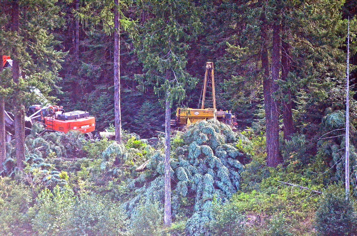 Machinery working to clear the wreckage of the Montana Rail Link derailed coal train near Heron. Photo Credit Erin Jusseaume Clark Fork Valley Press