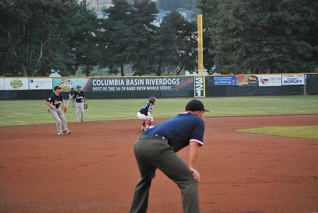 Bob Kirkpatrick/The Sun Tribune - River Dogs shortstop Joe Taylor holds a Tucson runner at second.