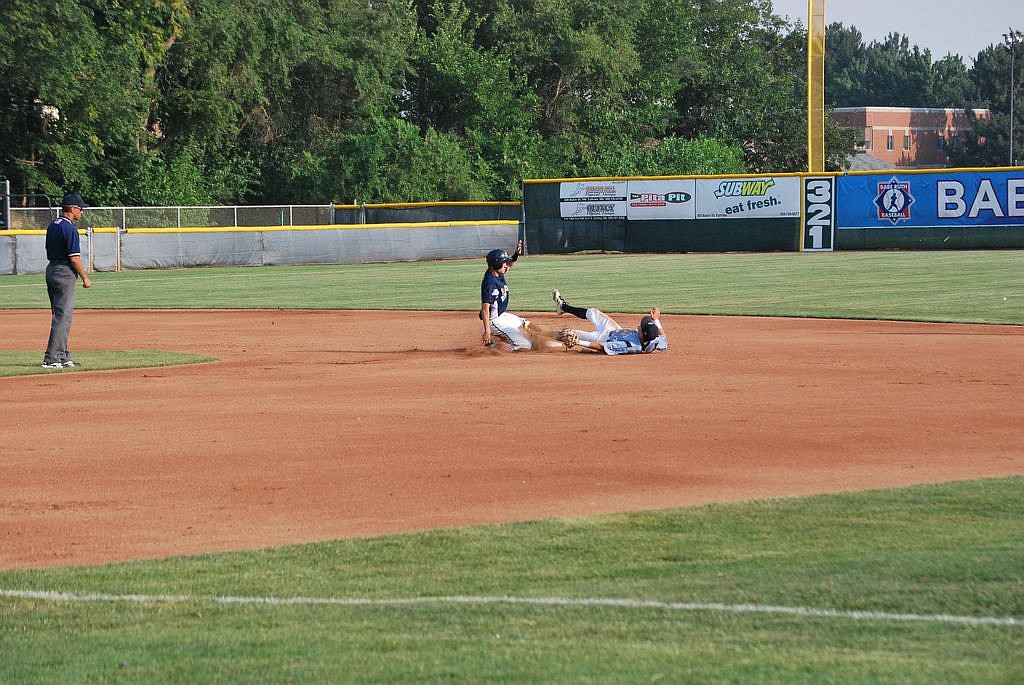 Bob Kirkpatrick/The Sun Tribune - Moses Lake's Evan McClean swipes second base.