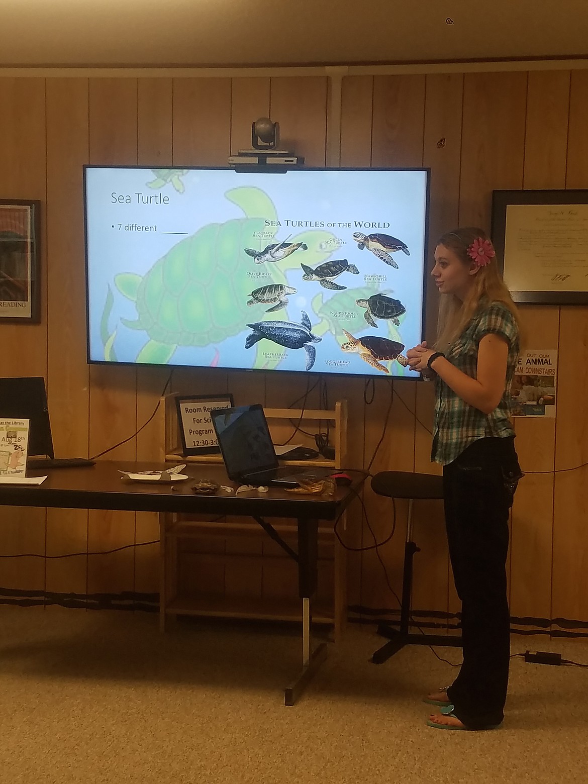 Photo by TANNA YEOUMANS
Amy Maggi in the middle of a presentation about Ocean Birds and Reptiles at the Boundary County Library on Aug. 4.