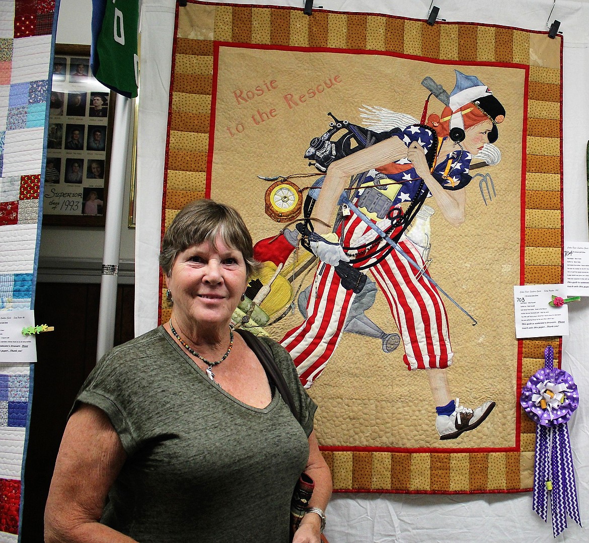 Della Russell, from St. Regis, won first place in the &#147;Bed Quilt-Machine Piece and Quilted by Self&#148; category for her Norman Rockwell&#146;s &#147;Rosie to the Rescue&#148; quilt. (Kathleen Woodford/Mineral Independent).