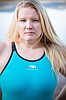 New high school swim coach knows how to endure