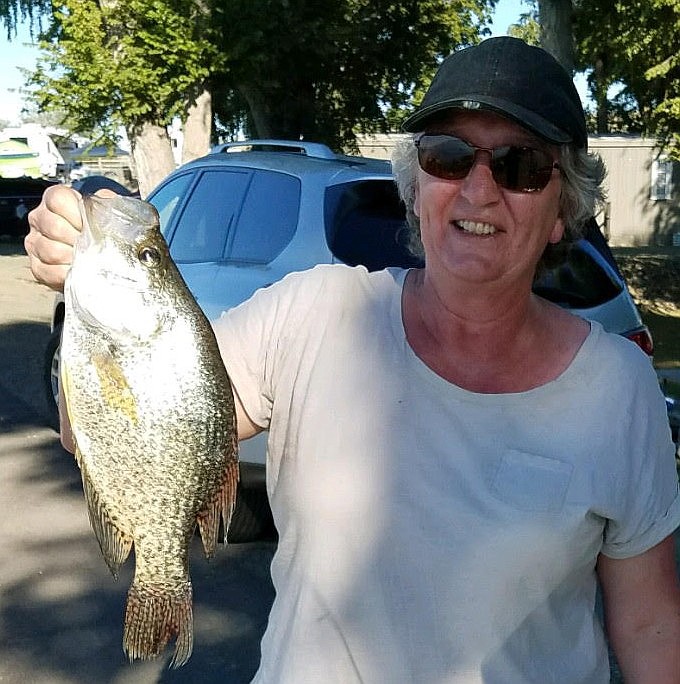 Annie Meseberg photo - Joni Nye of Monroe, WA caught this 16&quot; crappie off the MarDon dock - biggest dock crappie so far this year.