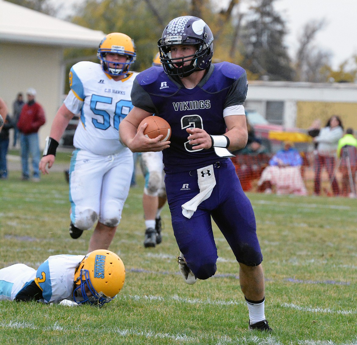 CHARLO VIKINGS quarterback Landers Smith finds an opening against Chester-Joplin-Inverness in the first round of the Class C, 8-man playoffs last season. Many coaches have named the Vikings as one of the favorites to win the state championship this year. Last season, Charlo finished second in the state in the Class C, 8-man with a loss to Ennis in the championship game. (Jason Blasco/Lake County Leader)