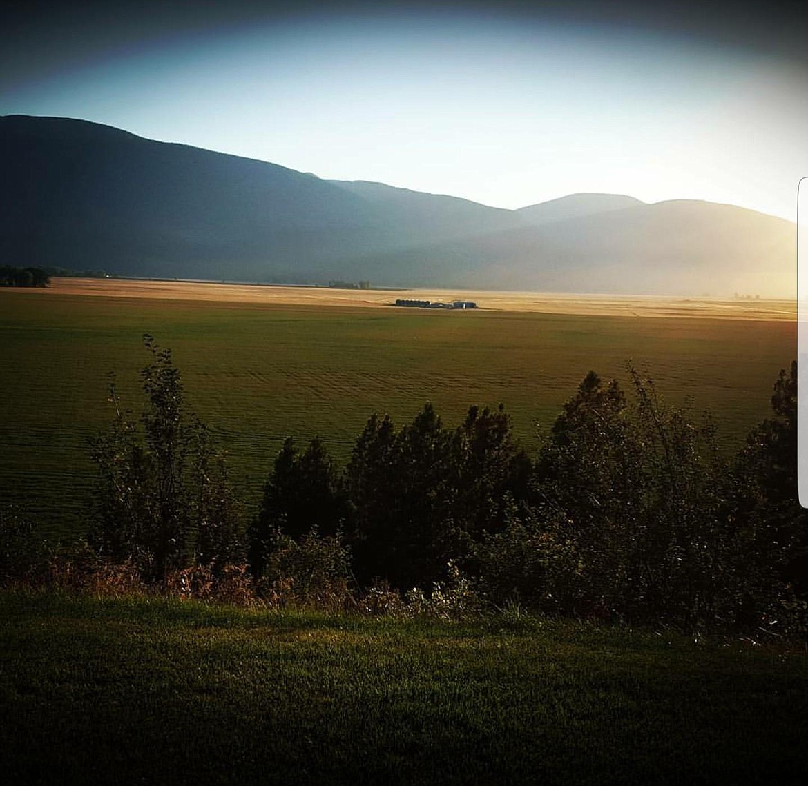 Photo by CASSIE OLSON
The farm pictured from the bench.