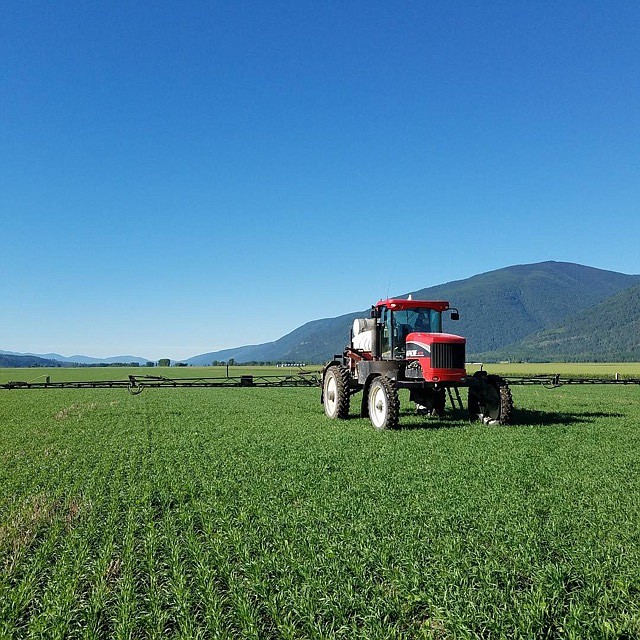 Photo by ERIK OLSON
Spraying winter wheat.