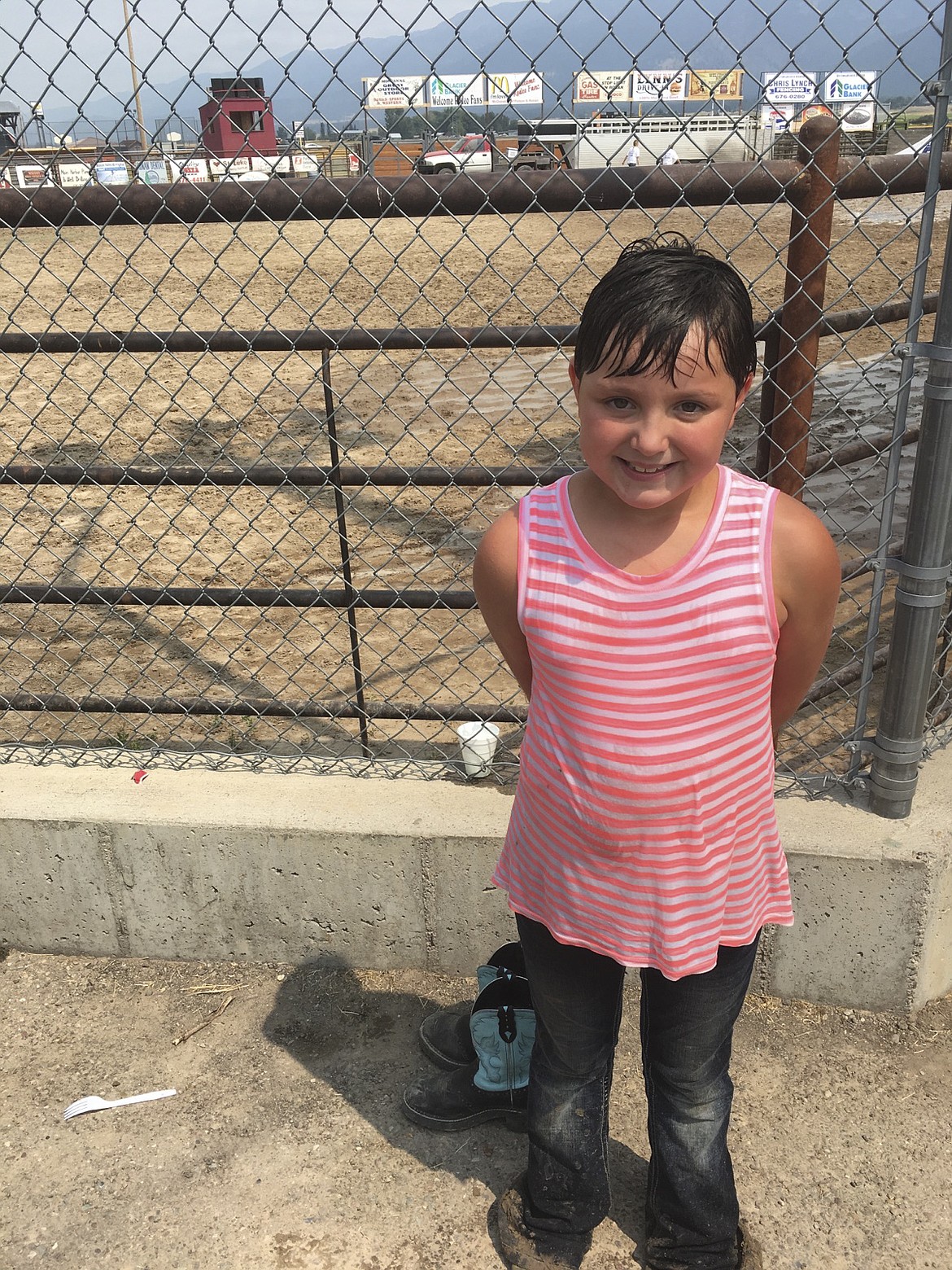 Maizey McDonald, of Charlo, poses for a picture after participating in the Kiddie/City Slicker Rodeo Saturday afternoon during Ronan Pioneer Days.