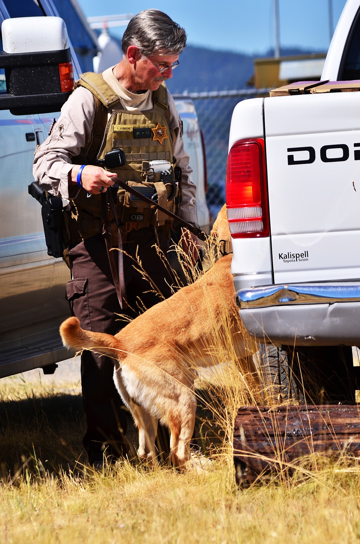 K-9 Max and Handler Lynn working through the first test for locating Narcotics. Photo Credit Erin Jusseaume Clark Fork Valley Press