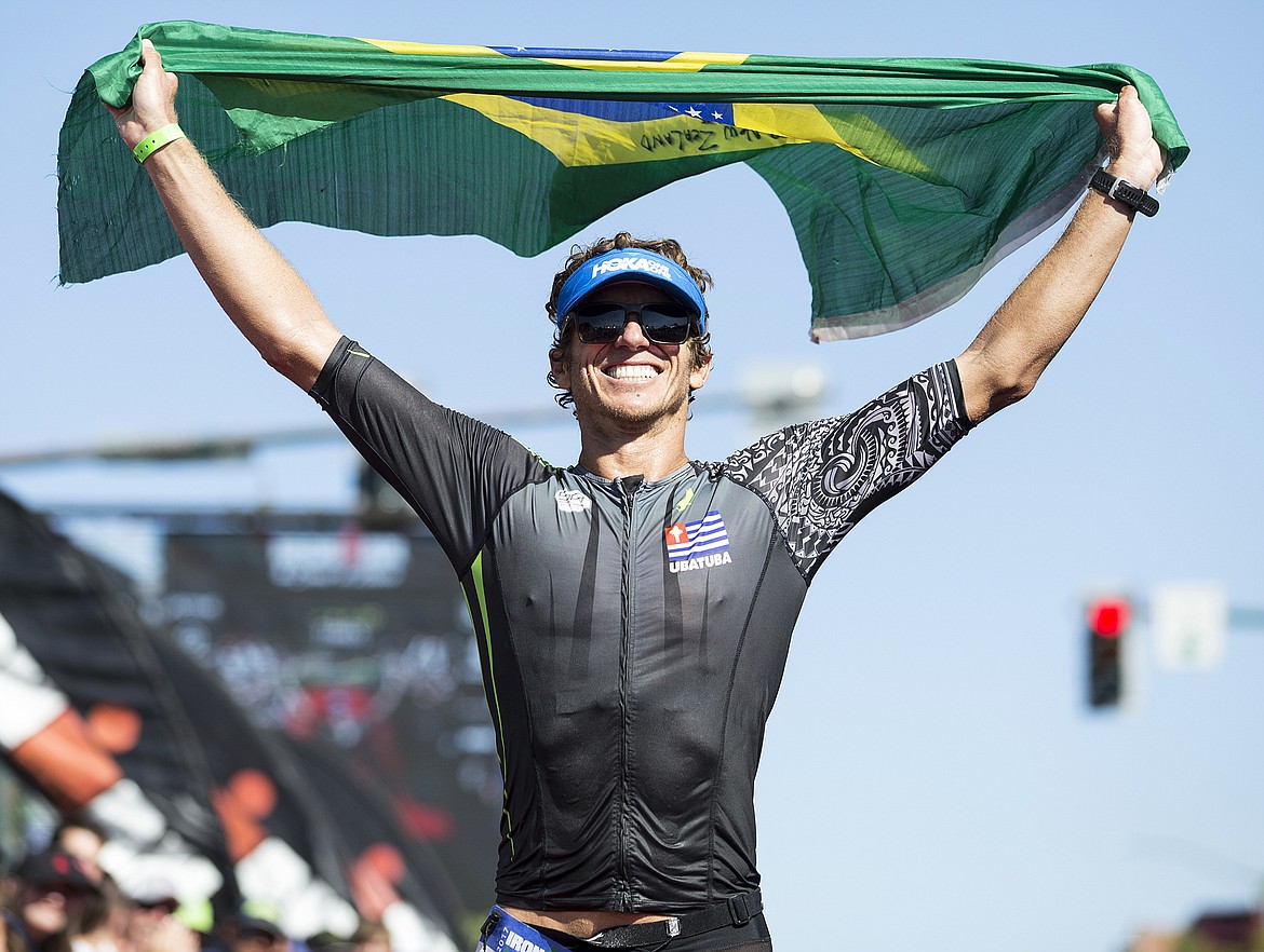 LOREN BENOIT/Press

Second place overall finisher Jose Graca, of Kailua Kona, Hawaii crosses the Ironman Coeur d&#146;Alene finish Sunday afternoon. Graca was born and raised in Brazil. He finished with a time of 9 hours, 33 minutes and 12 seconds.