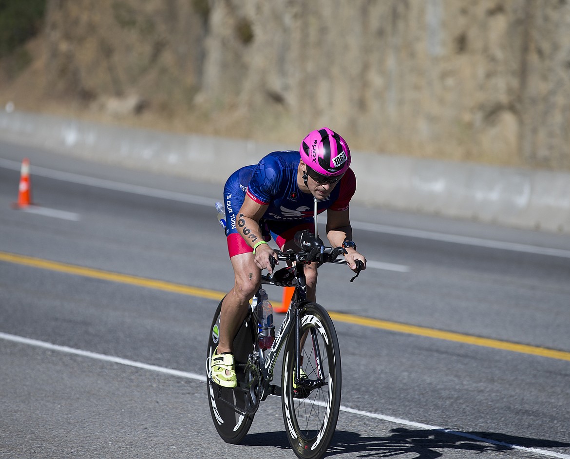 LOREN BENOIT/Press

Matthew Davis, of Dayton, Ohio makes his way down Mica Grade during Ironman Coeur d&#146;Alene.