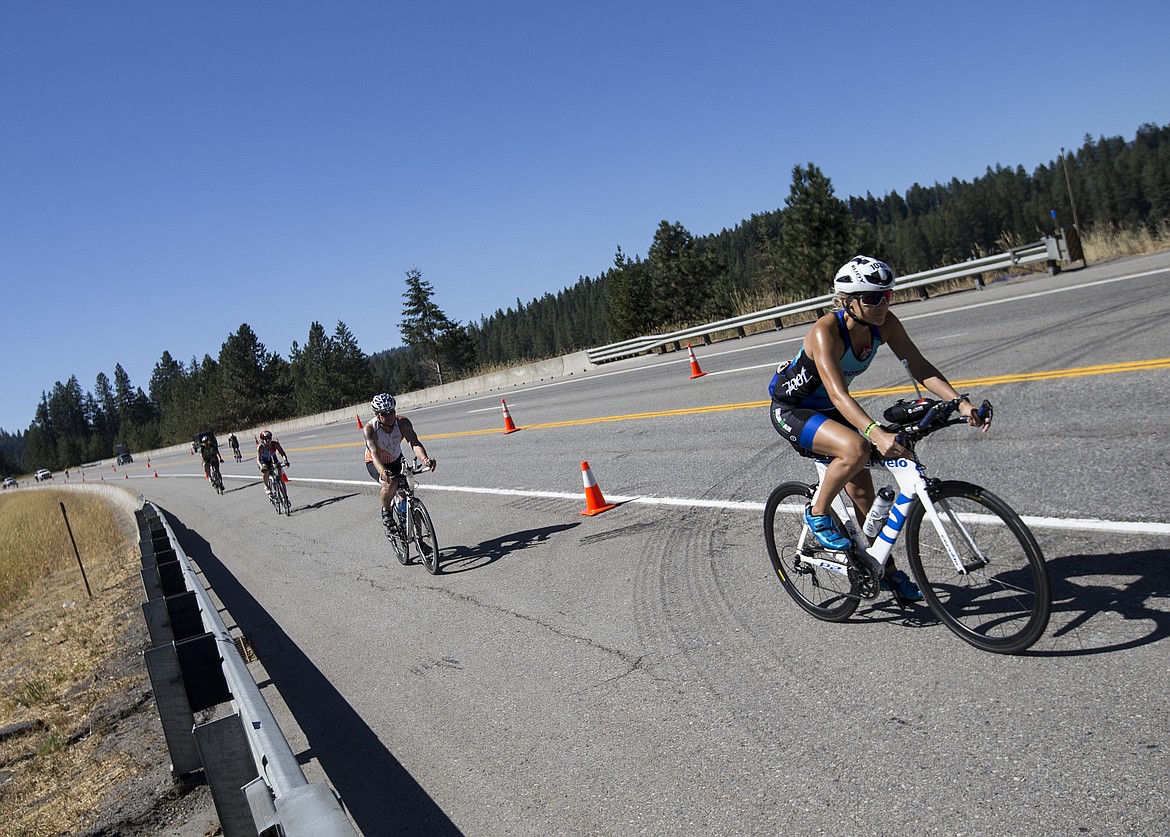 LOREN BENOIT/Press

Kylee Cederwall, of Reno, Nevada leads a pack of cyclists down Mica Grade during Ironman Coeur d&#146;Alene.