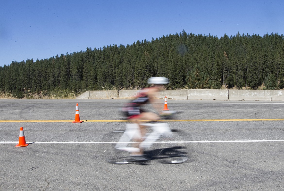 LOREN BENOIT/Press

A woman athlete races by during Ironman Coeur d&#146;Alene.