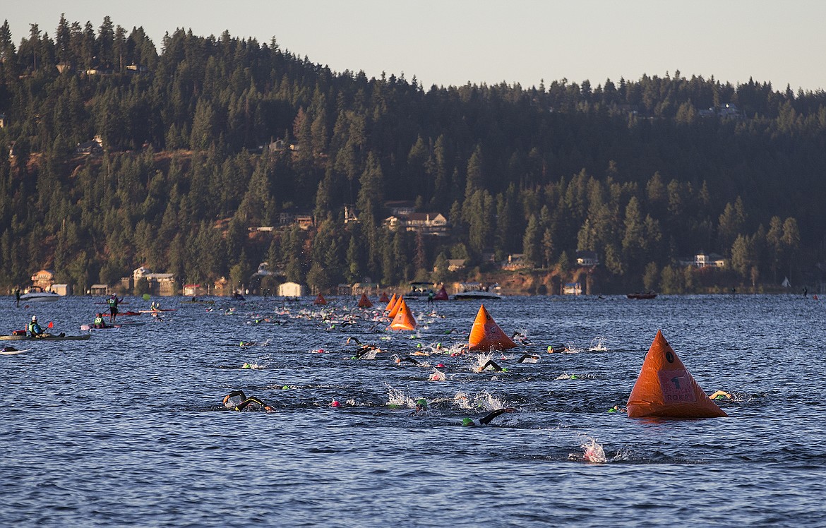 LOREN BENOIT/Press

Ironman Coeur d&#146;Alene athletes swim the 2.4 miles back to City Beach.