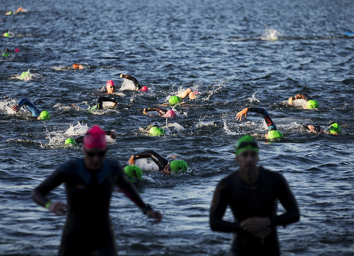 LOREN BENOIT/Press

Ironman Coeur d&#146;Alene athletes swim to City Beach before transitioning to the bike race.