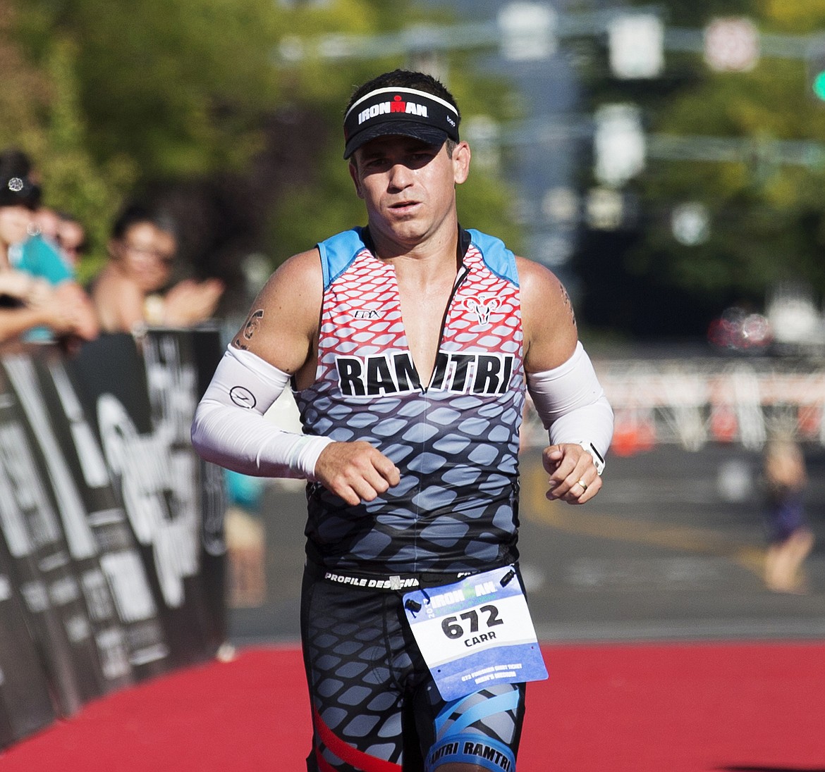 LOREN BENOIT/Press

Coeur d&#146;Alene resident Emry Carr approaches the Ironman Coeur d&#146;Alene finish line Sunday afternoon. Carr crossed the finish in 31st place overall with a time of 10 hours, 33 minutes and nine seconds.