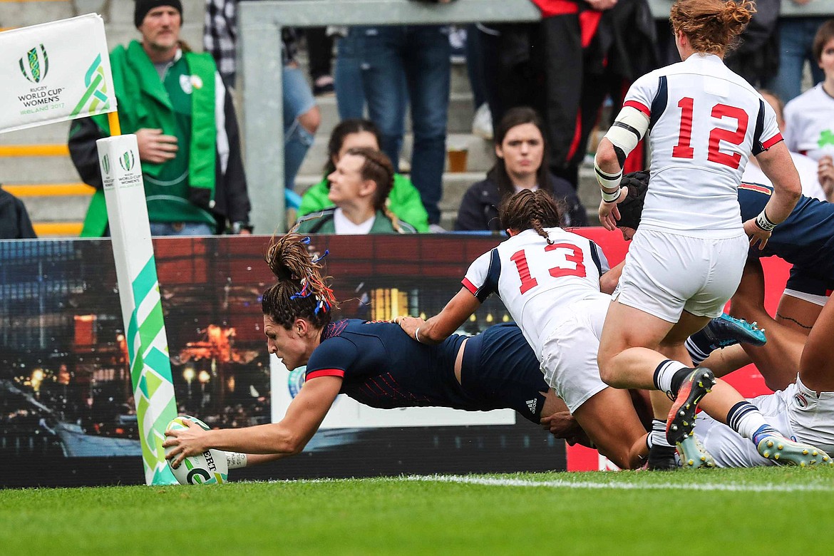 France second-row Lenaig Corson edges past Whitefish&#146;s Nicole Heavirland (13) to score a try in the Women&#146;s Rugby World Cup 2017 bronze final with USA on Saturday at Kingspan Stadium in Belfast. (INPHO/Billy Stickland)