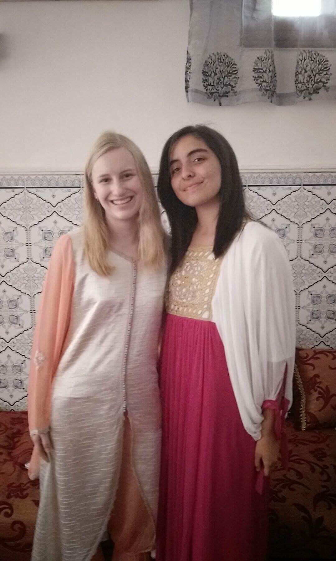 Makkie Haller, left, celebrates Eid al-Fitr &#147;feast of breaking the fast&#148; with her Moroccan host sister. The Muslim religious holiday marks the end of the month of Ramadan.