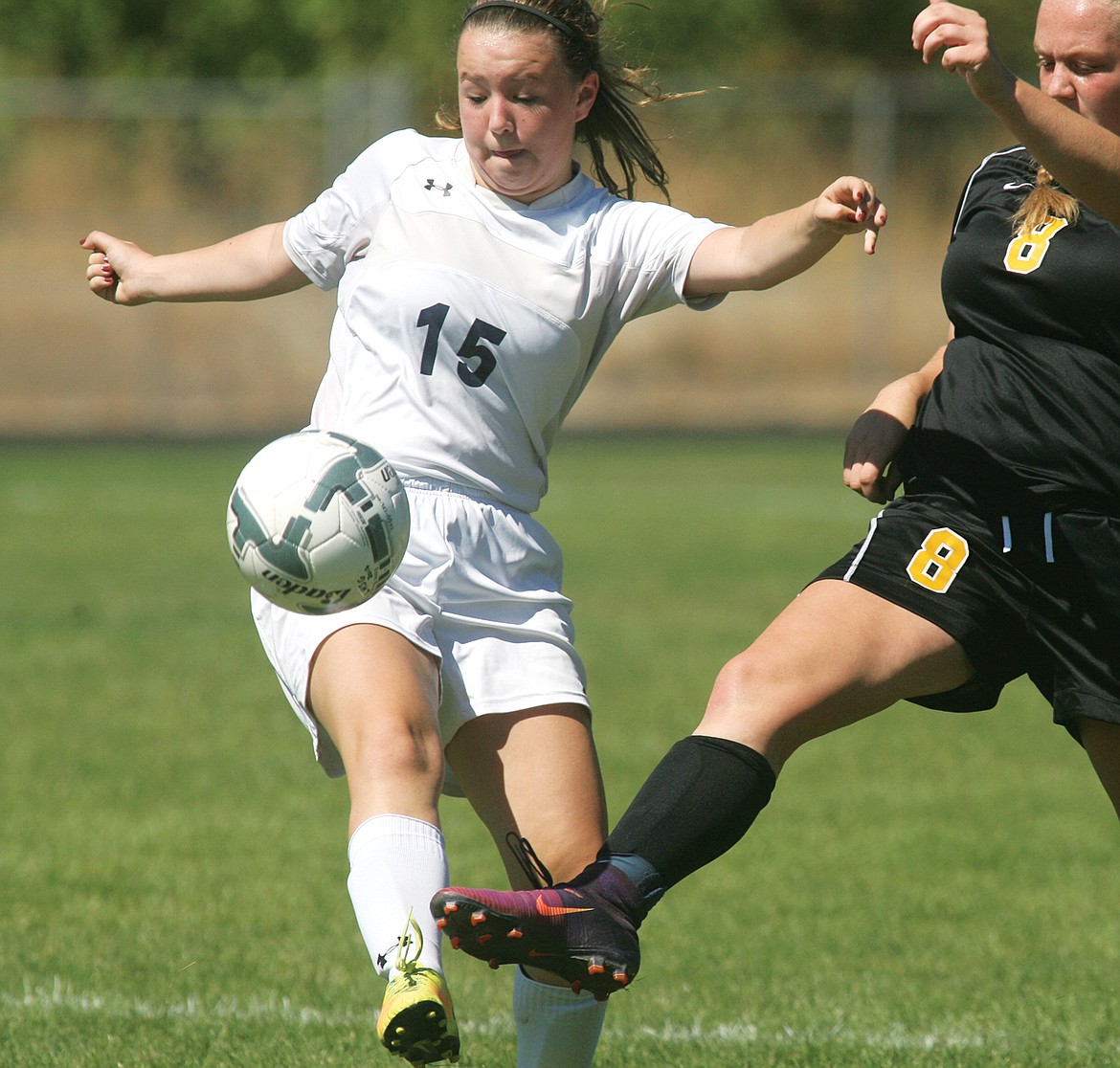 Libby&#146;s Rachel Carlisle, left, and Kylee Merwin battle for control in first half action vs. Stevensville Saturday.