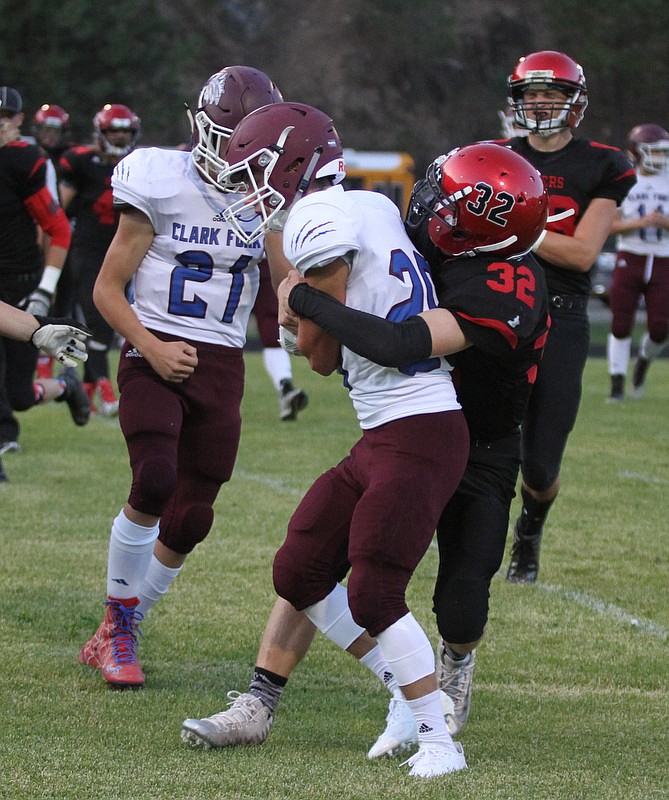 #32 Jaden Dimitroff plays some defense and makes the tackle.