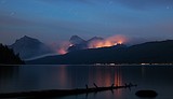 Rain gives a reprieve to smoke, but fires far from out