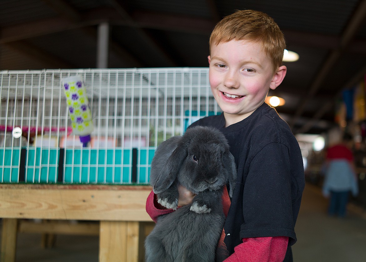 Breckin Green with his rabbit at the Northwest Montana Fair last week.