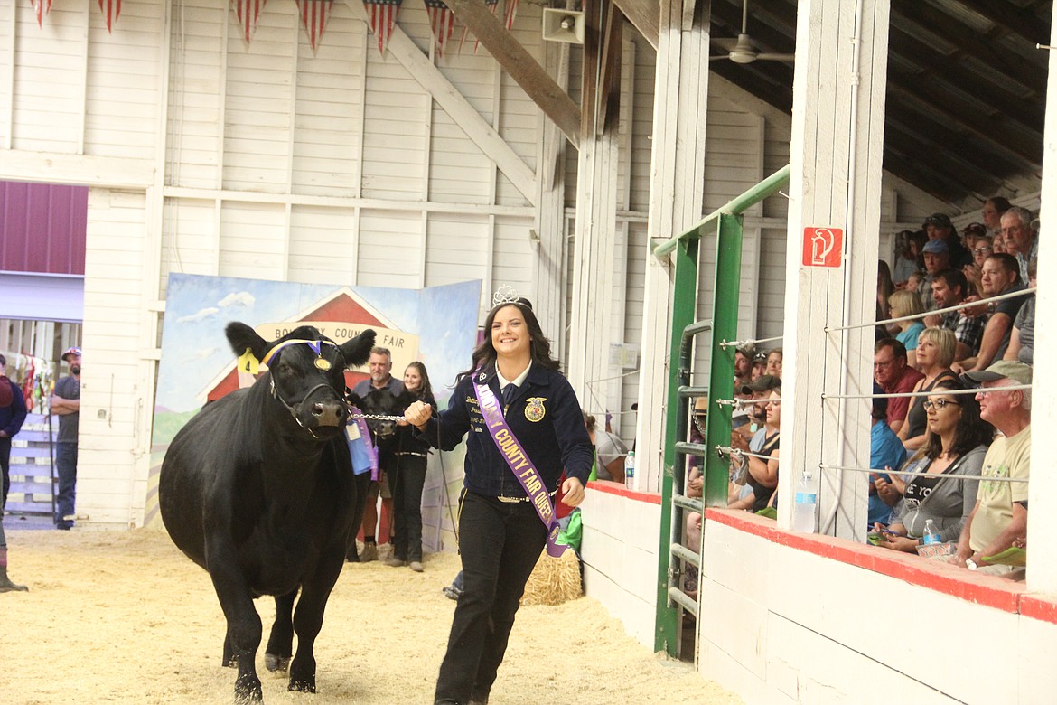 Photo By Tanna Yeoumans
Boundary County Fair Queen, Brittany Spangler shows a little muscle to her steer.