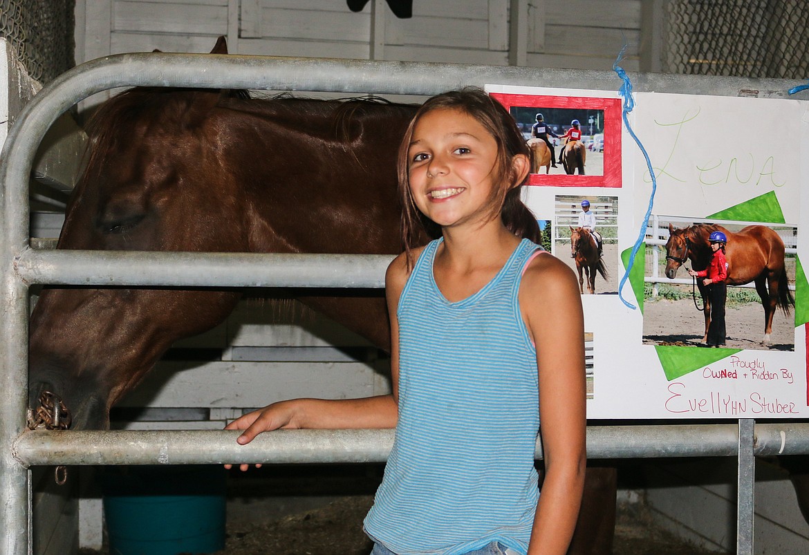 Photo by Mandi Bateman
Evellyhn Stuber with her new horse, Lena, won many ribbons at the fair.