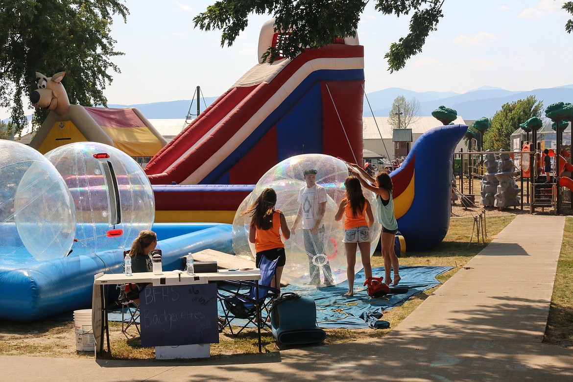 Photo by Mandi Bateman
Fair fun, from bouncey houses to bubbles.