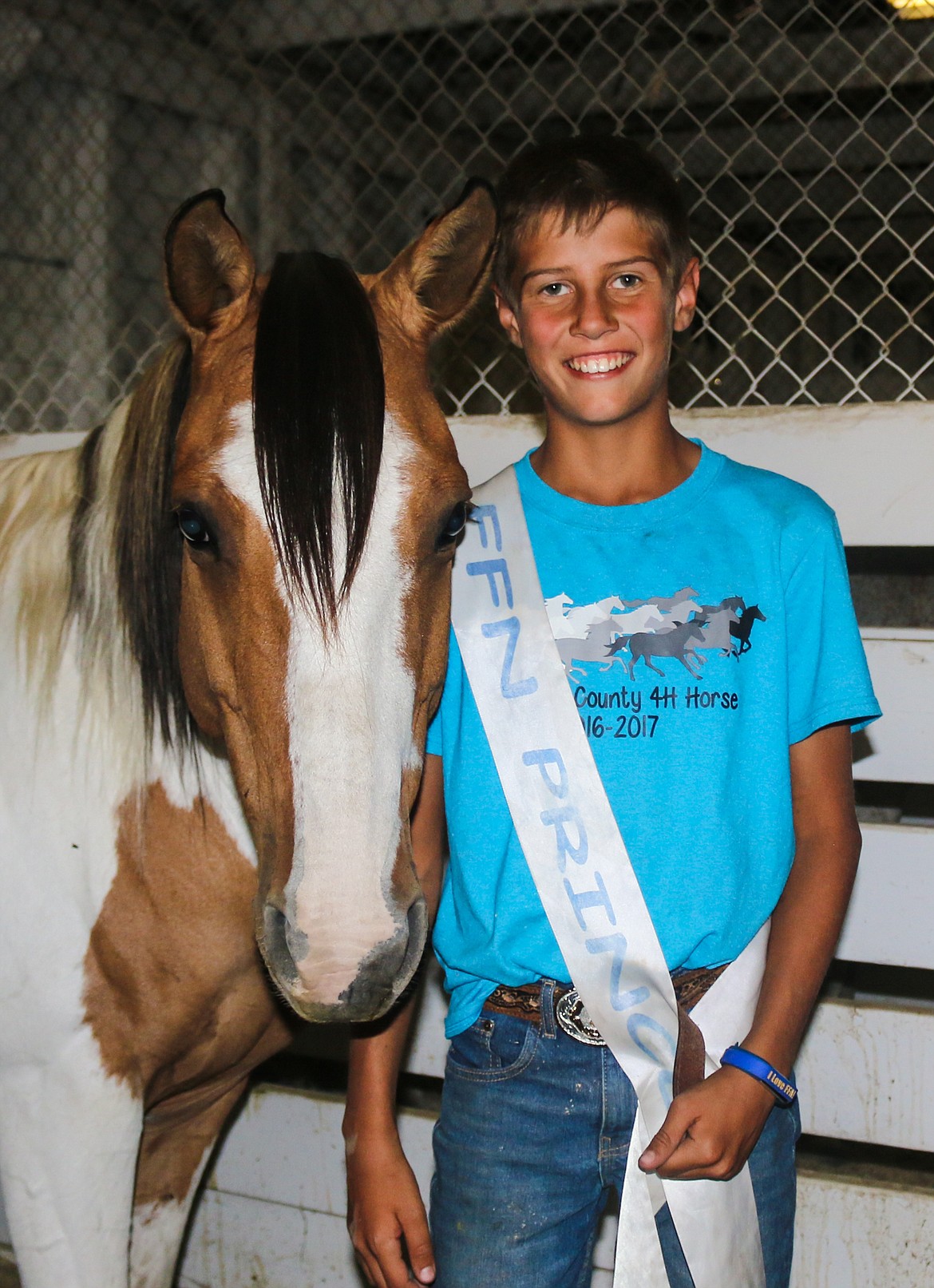 Photo by Mandi Bateman
Prince Riley Petesch with his horse, Rein. Together they won three first places.