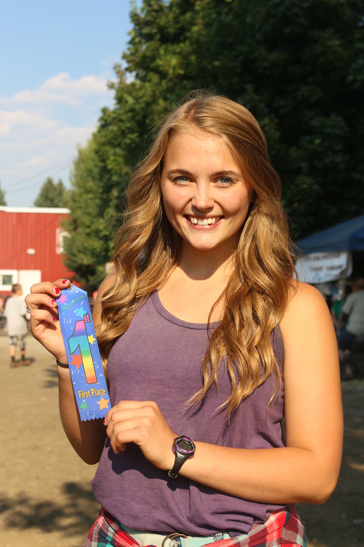 Photo by Mandi Bateman
Twelve year old Madison Riebe took first place in the Seed Spitting contest in her age group. Her mom, Shannon Riebe also took first place in her age group.