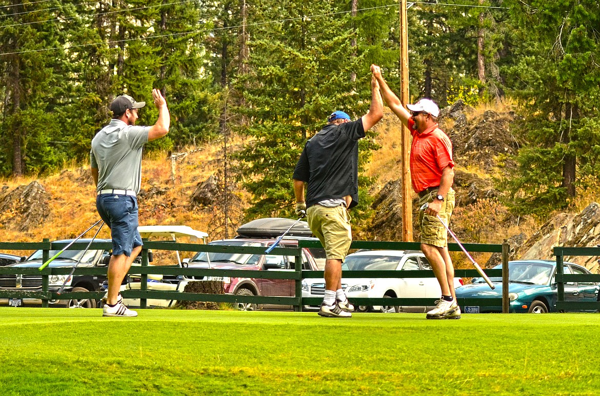 Golfer Kelly Kovarik sunk what we were told as his 10th long put on hole 9. (Erin Jusseaume/ Clark Fork Valley Press)