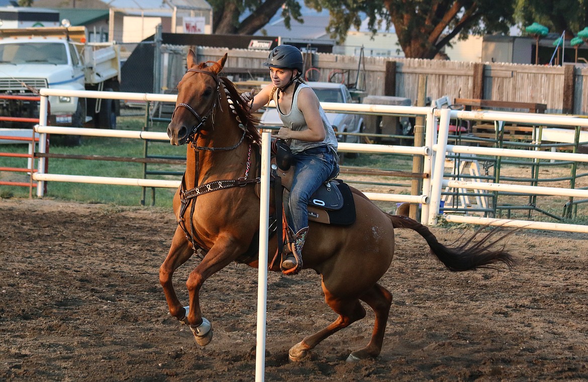 Photo by Mandi Bateman
2016 Fair Queen Mallorie Stippich, turns and burns during the Keyhole Race.