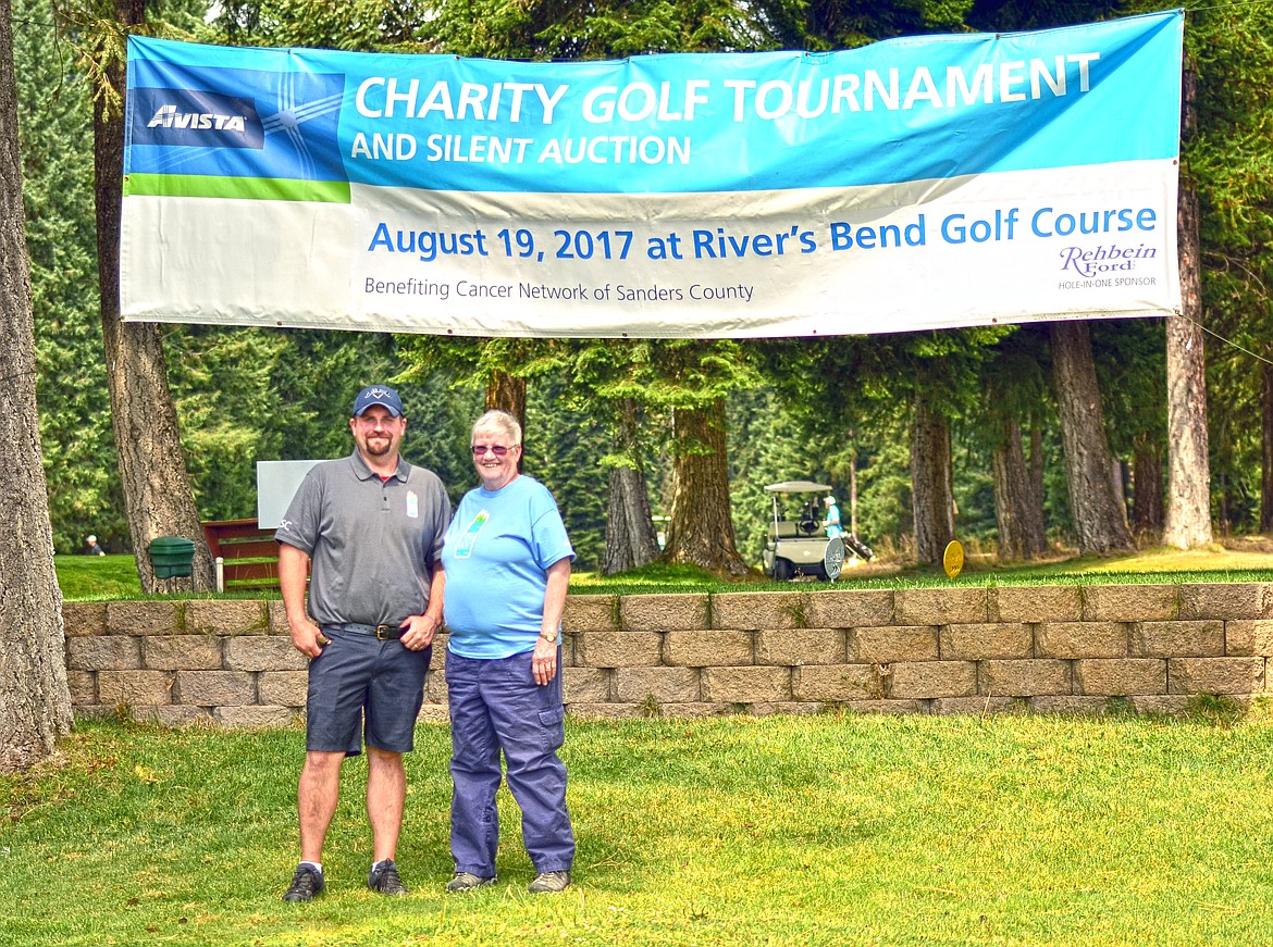 Sean Kelly (L) and Kathy Miller (R) were all smiles at the tournament on Saturday. (Erin Jusseaume/ Clark Fork Valley Press)