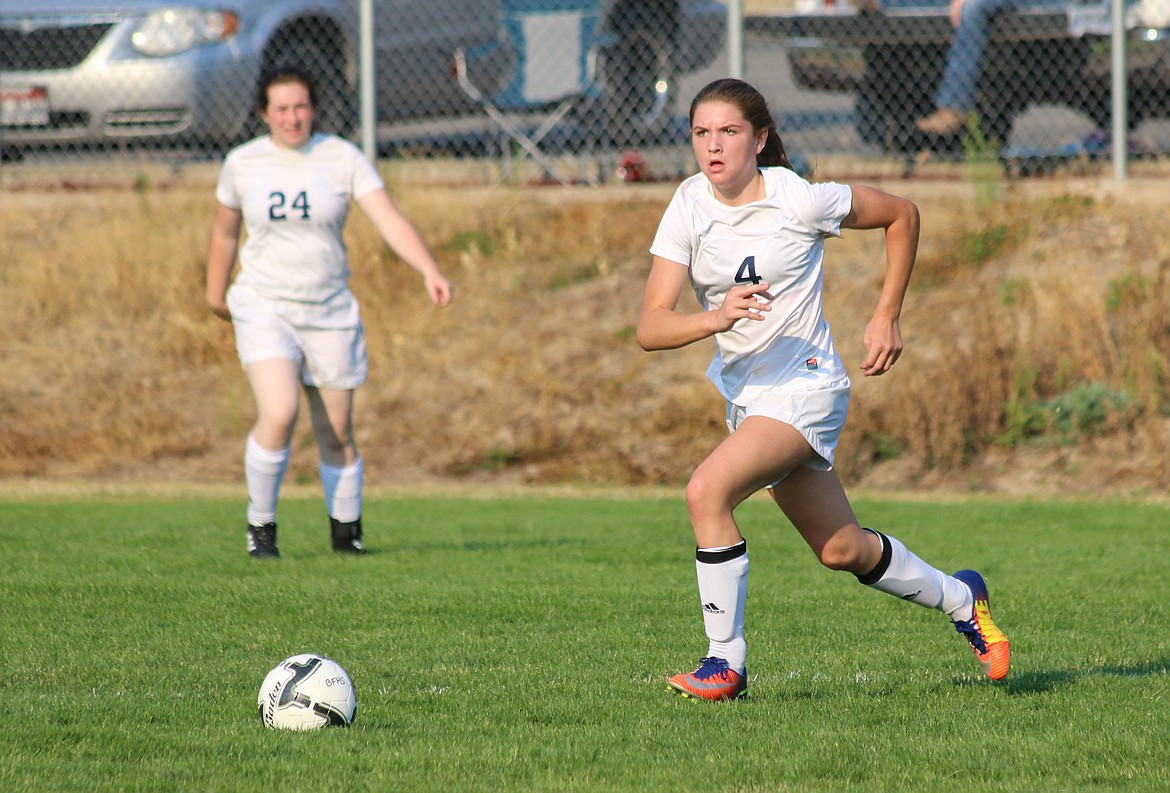 Holly Ansley dribbles the ball upfield during the Badgers&#146; 3-1 home win over Priest River on Saturday.