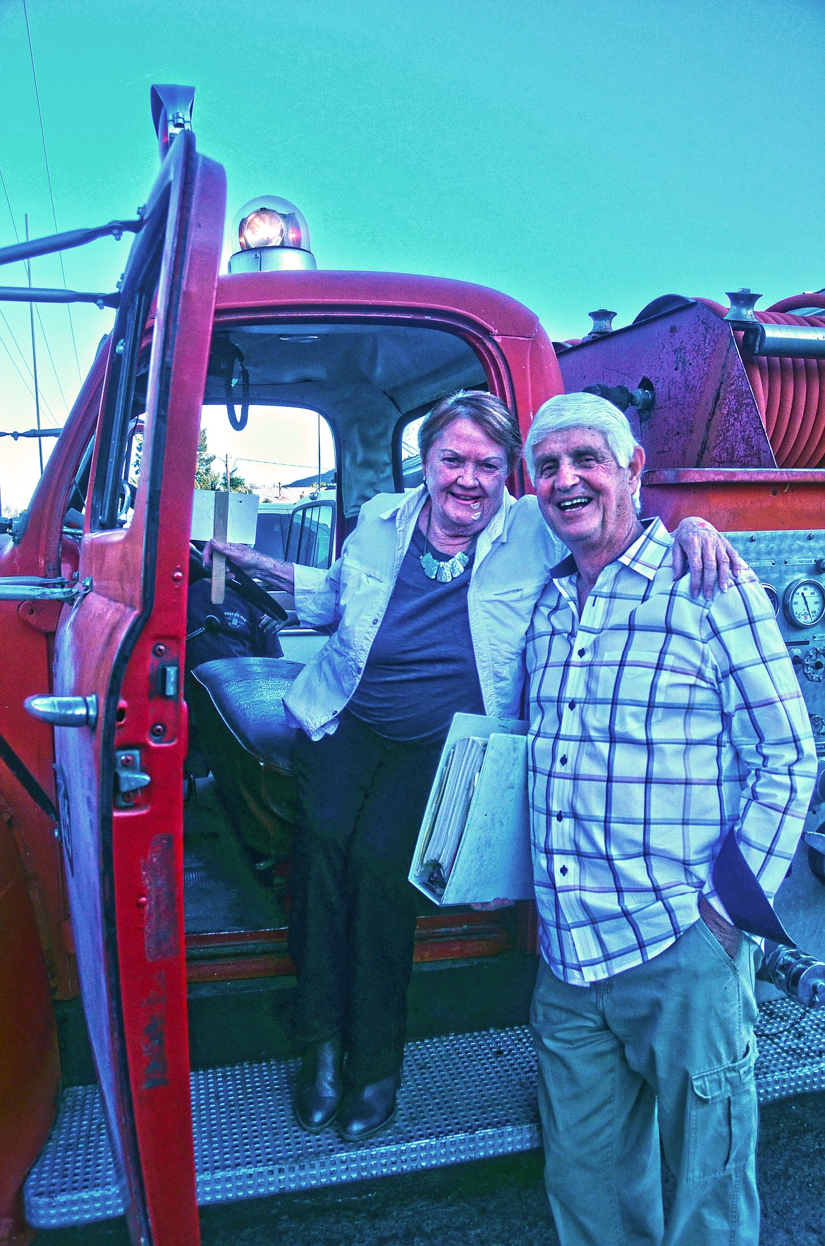 Patsy and Donny Wagoner are all smiles with their newly purchased antique fire truck. (Erin Jusseaume/ Clark Fork Valley Press)