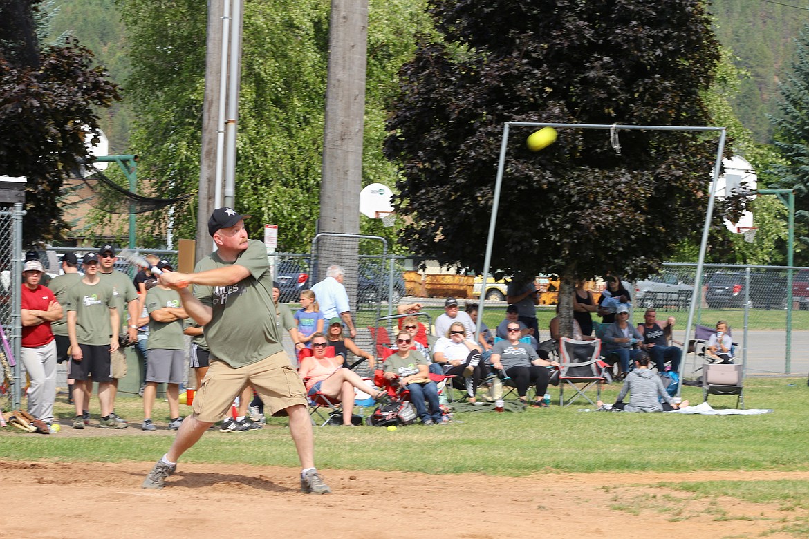 Sheriff Mike Gunderson swings for the fences.