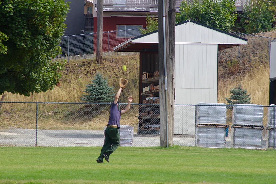 IDL firefighter Ryan &#147;Jeeter&#148; Klette dives for a hit into center field.