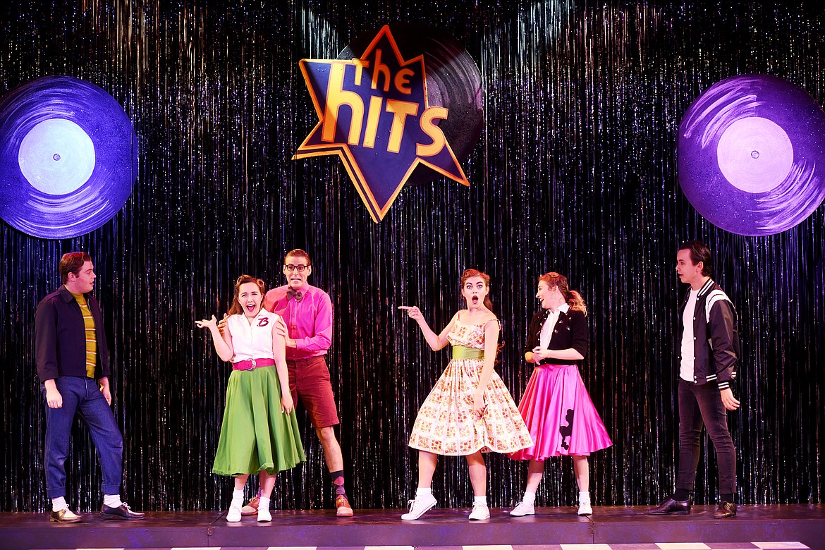 From left, Craig Franke, Brittany Ambler, Tyler Pirrung, Fiona Moweray, Kelly Kapur and Christian Fary rehearsing The Hits on Tuesday, August 29, at the Bigfork Summer Playhouse.(Brenda Ahearn/Daily Inter Lake)