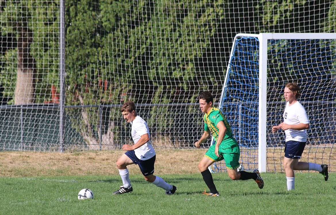 Dakota Nielsen defends the Badgers&#146; goal as Drew Foster follows and supports during a recent game against Lakeland.