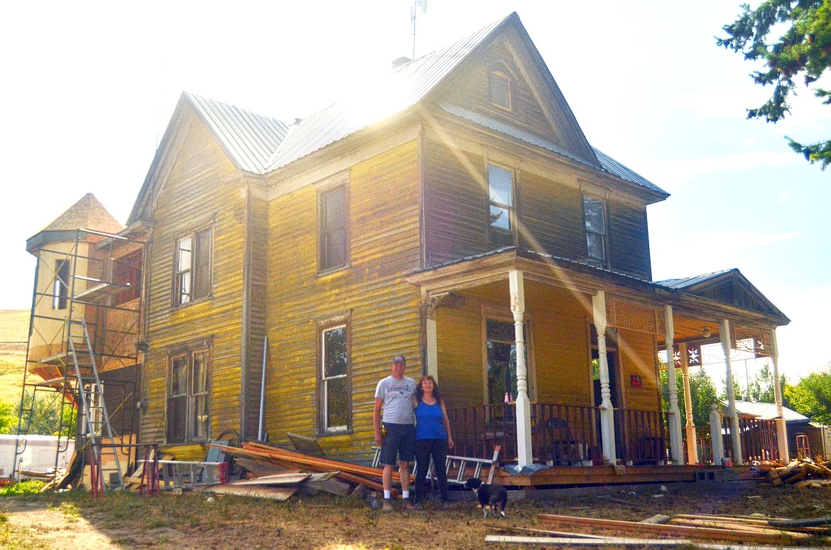 Joe Sheppard and Joann Mathers with Hondo. The back extension is pulling the dream together for this hometown classic makeover. (Erin Jusseaume/ Clark Fork Valley Press)